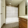 CORTINA BAÑO CALDEA PVC 180X200 TRANS.C/ANILLAS